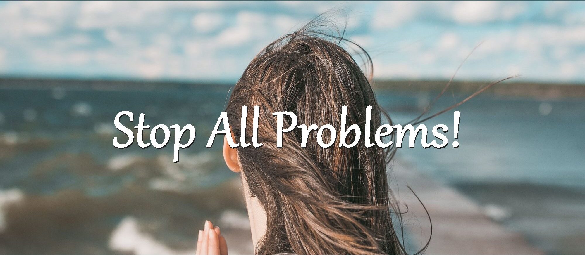 A woman looking out at the ocean stops all problems.